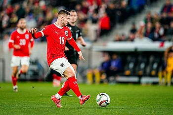 Romano Schmid on the ball for Austria