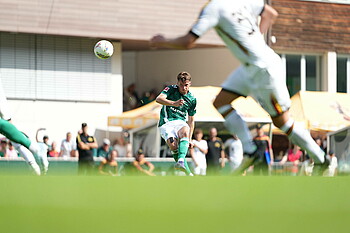 Olivier Deman takes a free-kick.
