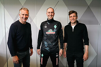 Frank Bumann, Ole Werner und Clemens Fritz stehen nebeneinander.