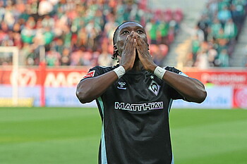 Derrick Köhn celebrates his match-winning goal.