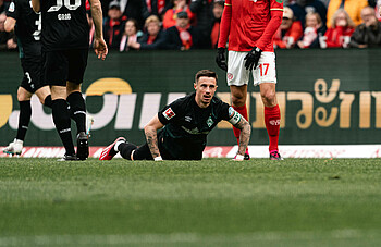 Marco Friedl on the ground.