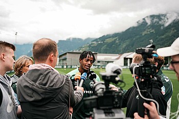 Samuel Mbangula in the Mixed Zone with the travelling journalists