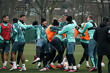 The squad enjoy a laugh in training.