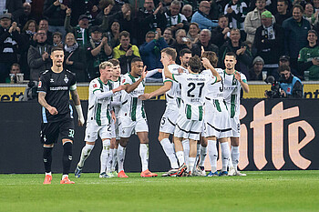 Gladbach celebrate, Friedl looks on angrily. 