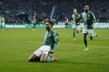 Njinmah celebrating his goal against Freiburg.