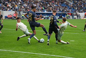 Julian Malatini pokes the ball into the back of the net.